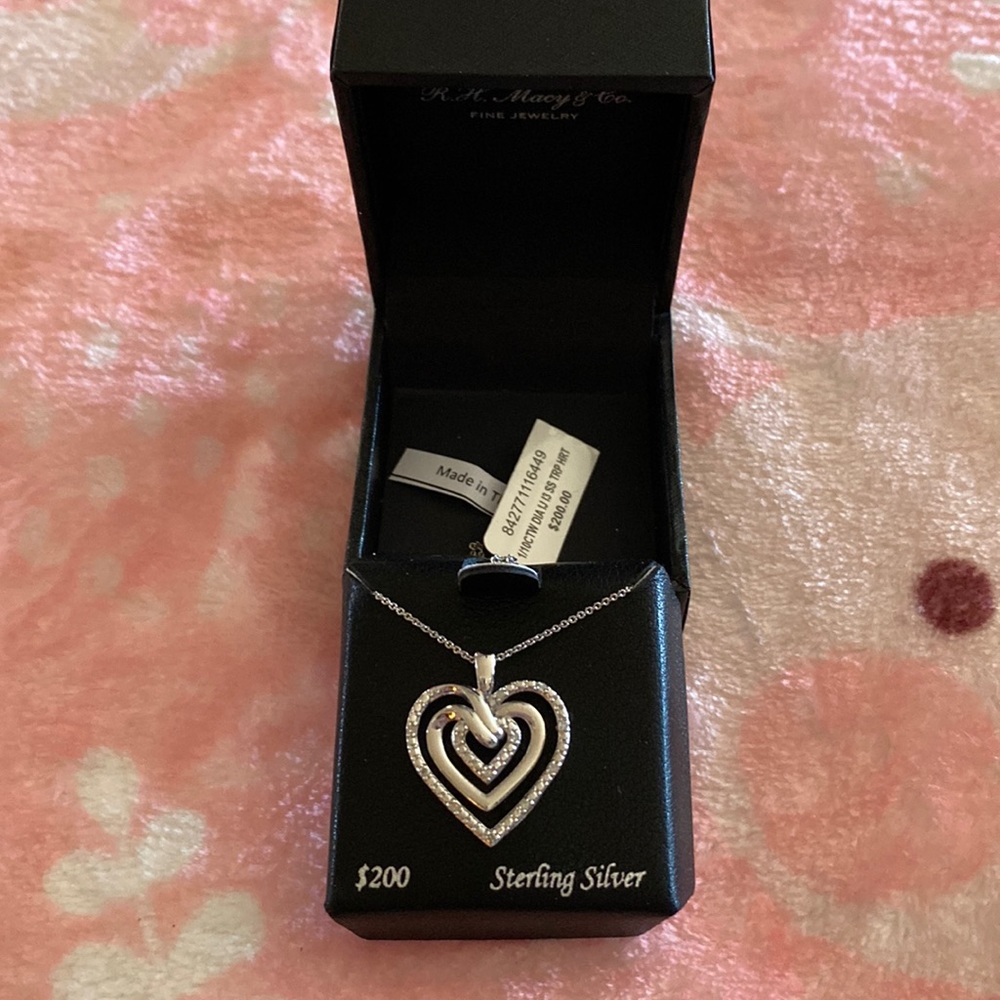 New with tag. Sterling Silver Bridge Diamond Multiple Heart Necklace.